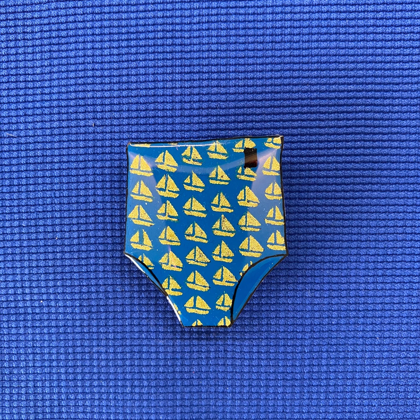 Maillot de bain homme bleu avec petits bateaux dorés